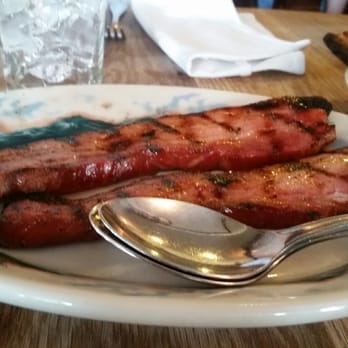 Peter Luger - Sizzling thick cut bacon appetizer - Steakhouses Near Me - Brooklyn, New York