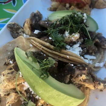 Lola's Mexican Cuisine - Ribeye Steak and egg tacos with roasted breakfast potatoes. - Mexican Near Me - Long Beach, California Lola's Mexican Cuisine - Ribeye Steak and egg tacos with roasted breakfast potatoes. - Mexican Near Me - Long Beach, California