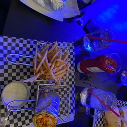 The Atmosphere - Spicy chicken wrap with fries, chicken burger