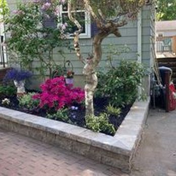 Magic Tools - a garden in front of a house - General Contractors Near Me