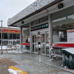 Ossington Subway Station - Outside station entrance to the north looking south from sidewalk. Photo taken February 2019
