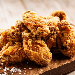 Crispy fried chicken, golden on the outside and juicy inside--the ultimate comfort food for serious crunch lovers.