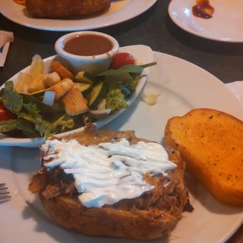 Smokey Bones Greensburg - Loaded baked potato and side salad with garlic toast - Barbeque Near Me - Greensburg, Pennsylvania Smokey Bones Greensburg - Loaded baked potato and side salad with garlic toast - Barbeque Near Me - Greensburg, Pennsylvania