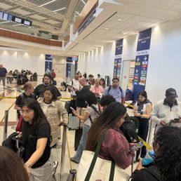 Long delays. Barely manned counters. Long delays. Barely manned counters.