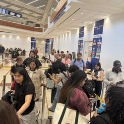Hertz Rent A Car - Long delays. Barely manned counters.