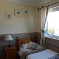 Clai Ban Bed and Breakfast - a cosy bedroom, overlooking the garden and the sea
