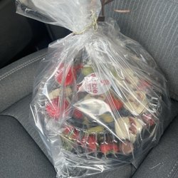 Edible Arrangements - This is a round fruit platter that has about six strawberries that look like they've been sitting on a shelf for weeks.