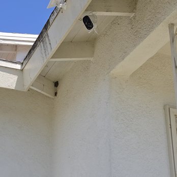 Salambek Handyman - Installation of solar panels for security cameras in the front of the house and backyard on the garage. - Tiling Near Me - Los Angeles, California