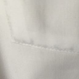 Black staining along the corner of my shirt pocket. This is how i received my shirt :/ Black staining along the corner of my shirt pocket. This is how i received my shirt :/