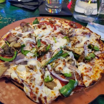 Soul - Supreme pizza, pepperoni, green peppers, red onions, sausage on a thin crust. Took a hot minute but was served hot and was very tasty. 10". - Italian Near Me - Nashville, Tennessee