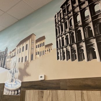 Lucky's Pizza - a mural of buildings and a clock - Pizza Near Me - Surprise, Arizona Lucky's Pizza - a mural of buildings and a clock - Pizza Near Me - Surprise, Arizona
