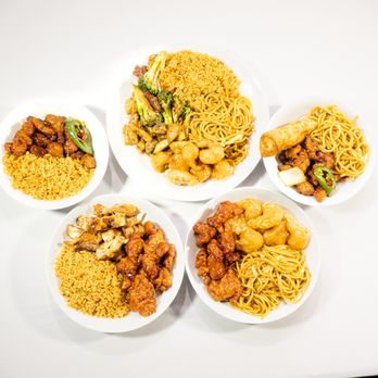 Happy Dragon - four bowls of chinese food on a table - Chinese Near Me - Bakersfield, California
