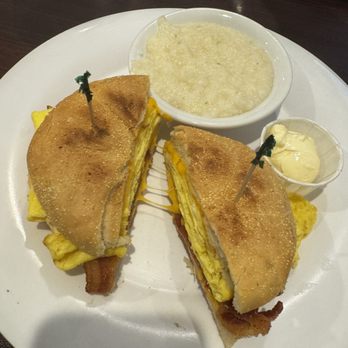 Stacks Kitchen - Bacon Egg and Cheese on Kaiser roll with side of grits - Breakfast & Brunch Near Me - Matthews, North Carolina