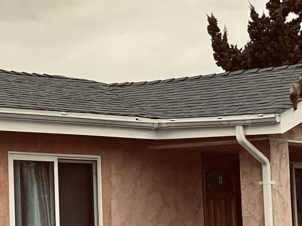 Slide of HGG Roofing