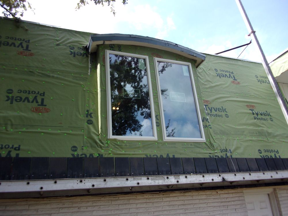 Slide of Berryman Roofing