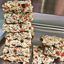 Try the house Raw Bar with or without cocoa - yummy! And less then 200 calories but a great pre or mid workout snack.