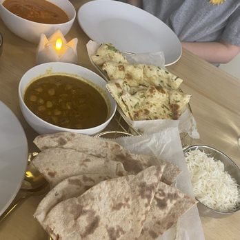 Imli Indian Kitchen & Bar - Table full of food! - Indian Near Me - Ormond Beach, Florida
