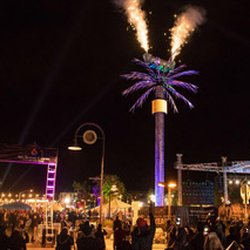Audio Visual Live - New year's eve celebration with LED video, sound, pyro, and custom-built 60' tall palm tree