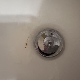 More brown rust stains in the tub.