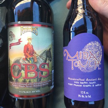 Westside Beverage - a hand holding a bottle of cid - Beer, Wine & Spirits Near Me - Cumming, Georgia Westside Beverage - a hand holding a bottle of cid - Beer, Wine & Spirits Near Me - Cumming, Georgia