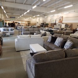 Furniture Solutions - We sell Ashley Sofas, Sectionals, Recliners, Bedroom Sets and Dining Room Sets