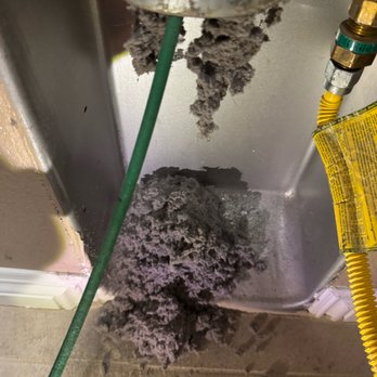 Dryer Vent Superheroes - Before: The blockage - Appliances & Repair Near Me - Las Vegas, Nevada