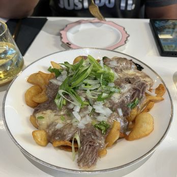 Breaking Dawn Brunch - Pho Poutine - Doesn't look appetizing but really good! Has the pho aroma. Think of pot roast but a pho version with potatoes. - Breakfast & Brunch Near Me - Los Gatos, California