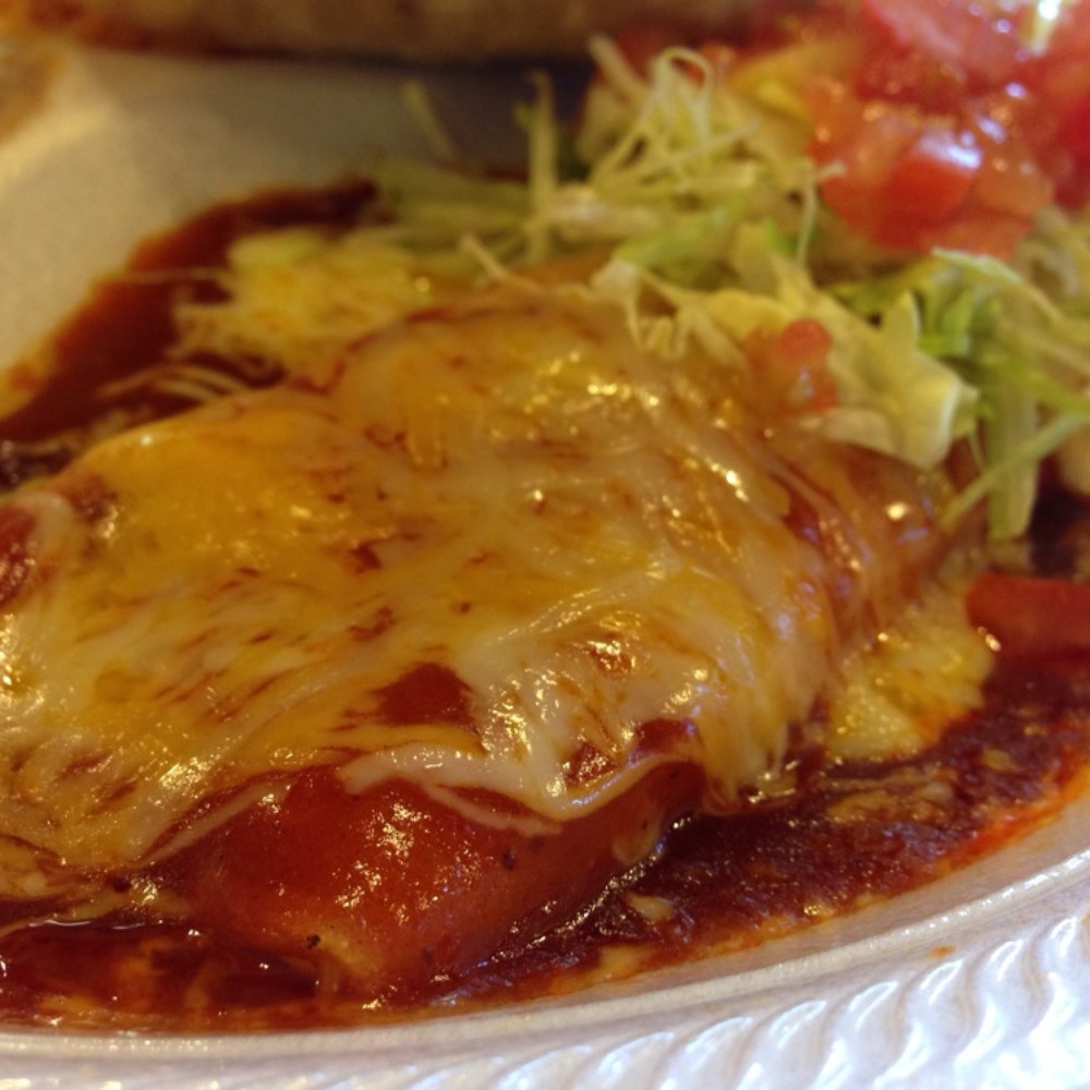 Armando's Mexican Food - Cheese enchilada close up; good red sauce - Mexican Near Me - Abilene, Texas Armando's Mexican Food - Cheese enchilada close up; good red sauce - Mexican Near Me - Abilene, Texas