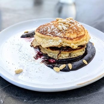Solbar - Ricotta and blueberry sauce pancake made inhouse - New American Near Me - Calistoga, California Solbar - Ricotta and blueberry sauce pancake made inhouse - New American Near Me - Calistoga, California