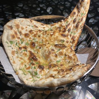Musaafer - Garlic Naan - Indian Near Me - Houston, Texas Musaafer - Garlic Naan - Indian Near Me - Houston, Texas