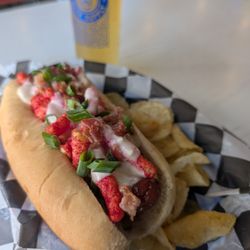 Jefferson Beer Supply - Trash Panda, a wurst topped with Hot Cheetos, beer cheese, bacon and green onions.