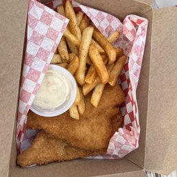 Fried flounder meal with old bay fries and tarter sauce.
