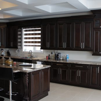 Kitchen & Bath Inc. - When going for dark Cabinets you can get some contrast in your kitchen with the floors, the counter top or the back splash - General Contractors Near Me Kitchen & Bath Inc. - When going for dark Cabinets you can get some contrast in your kitchen with the floors, the counter top or the back splash - General Contractors Near Me