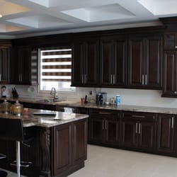 Kitchen & Bath Inc. - When going for dark Cabinets you can get some contrast in your kitchen with the floors, the counter top or the back splash