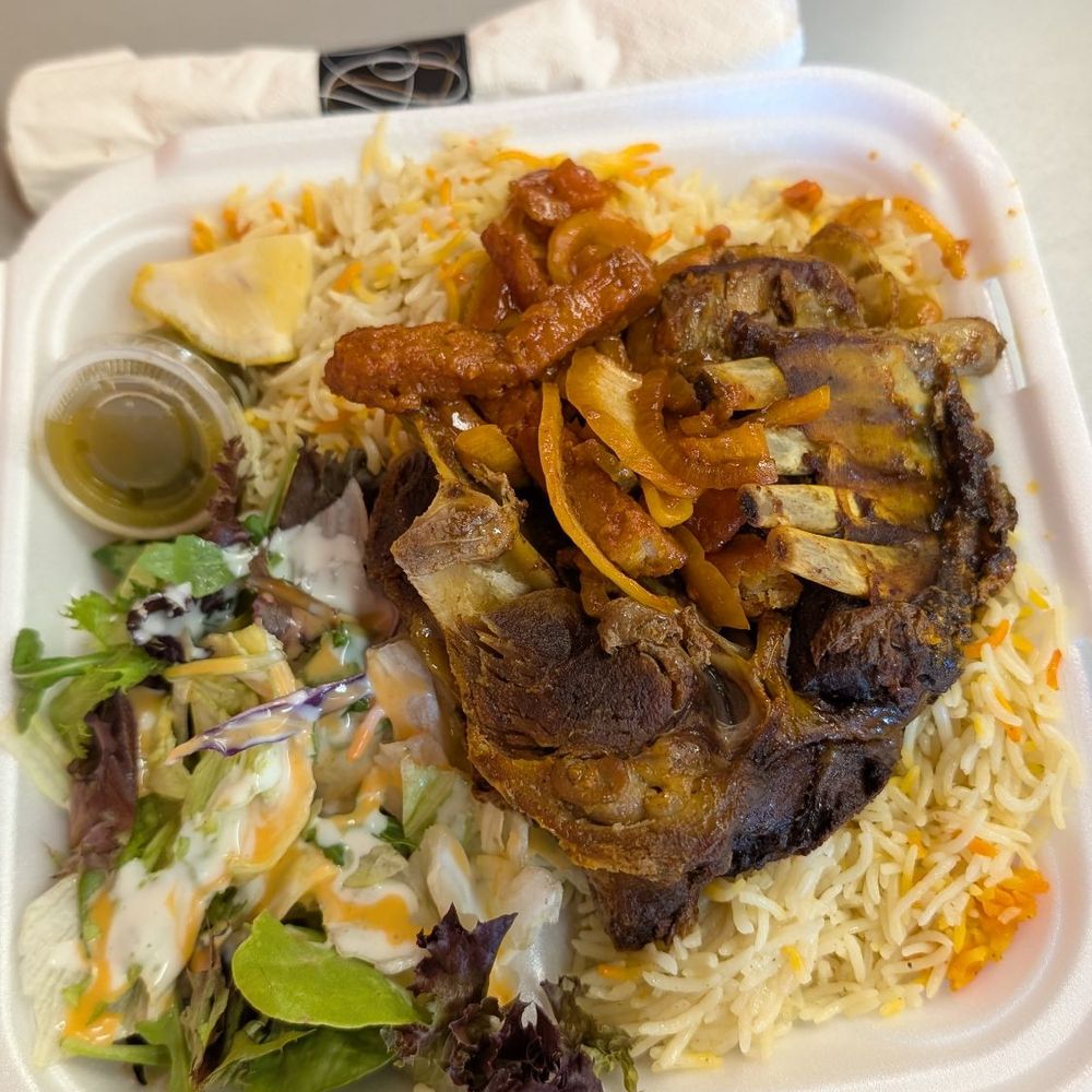 Tawakal Restaurant - Goat meat with rice - African Near Me - Burnsville, Minnesota Tawakal Restaurant - Goat meat with rice - African Near Me - Burnsville, Minnesota