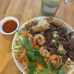 V1 Rice noodle bowl with grilled pork & shrimp & veggies with matcha milk tea (not sweet).