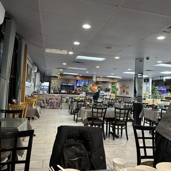 Anh Thu 2 - a restaurant with tables and chairs - Vietnamese Near Me - Worcester, Massachusetts