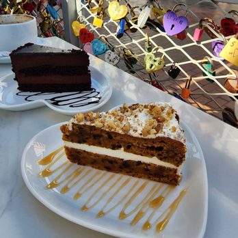 Utopia Caffe - devils cake in the back, carrot cake in the front- pass on both - Breakfast & Brunch Near Me - Tustin, California