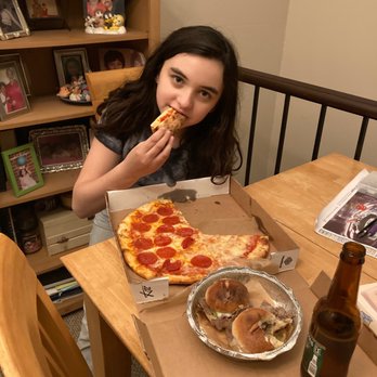 Taproom Pizza - Happy kid eating dads food   dad's food - Pizza Near Me - Culver City, California