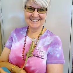Center Preschool - Ms. Pat with a student's pet chameleon!!