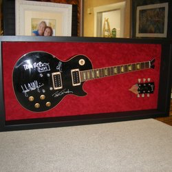 Beveled Edge - NIN autographed guitar