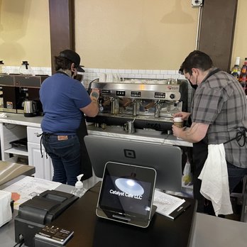 Catalyst Cafe - a man and a woman working in a coffee shop - Coffee & Tea Near Me - Everett, Washington Catalyst Cafe - a man and a woman working in a coffee shop - Coffee & Tea Near Me - Everett, Washington