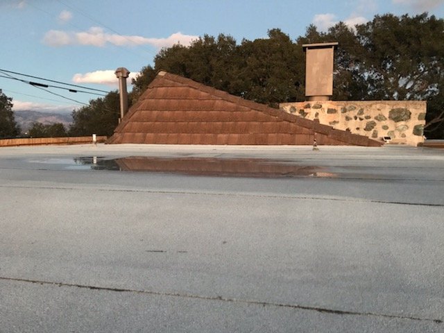 Slide of Titan Roofing & Rain Gutters Inc.