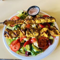 Crazy Pita Rotisserie & Grill - Mediterranean Salad with two chicken skewers