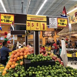 people shopping in a grocery store