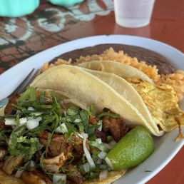 Taco platter: Trompo and breakfast taco (egg potato and chorizo) Taco platter: Trompo and breakfast taco (egg potato and chorizo)