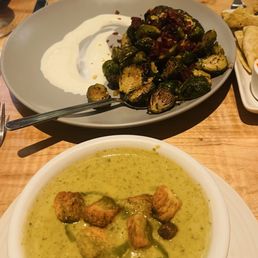 Cream of broccoli soup and bourbon glazed Brussel sprouts. Cream of broccoli soup and bourbon glazed Brussel sprouts.