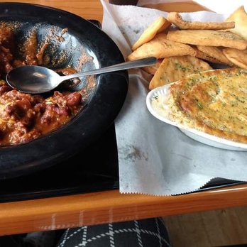 Fork'n Links - A chili bowl and a spinach dip with pita chips - Sports Bars Near Me - Myrtle Beach, South Carolina Fork'n Links - A chili bowl and a spinach dip with pita chips - Sports Bars Near Me - Myrtle Beach, South Carolina