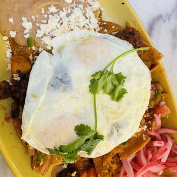 Haven Haus Cafe - Chilaquiles with chorizo. The chorizo has some heat and it was super good!! Loved it. - Breakfast & Brunch Near Me - Temecula, California Haven Haus Cafe - Chilaquiles with chorizo. The chorizo has some heat and it was super good!! Loved it. - Breakfast & Brunch Near Me - Temecula, California