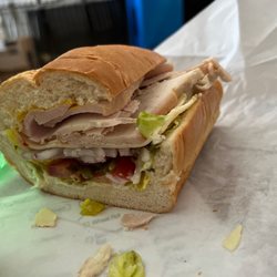 Valnizza's Deli & Market - Turkey on soft baked with pepper jack cheese and all the fixings $10 can't beat it (only half the sandwich)